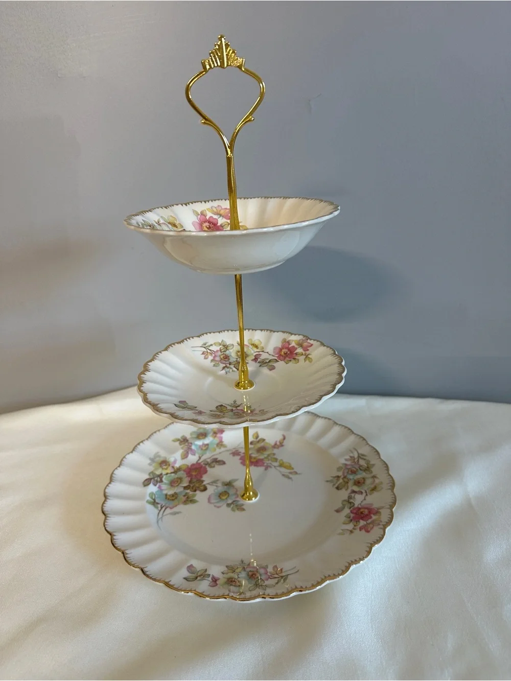 Three-Tier Porcelain Serving Stand with Pink Floral Pattern and Gold Trim